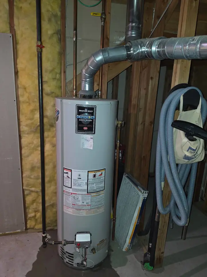 New Bradford White gas water heater installed with new venting