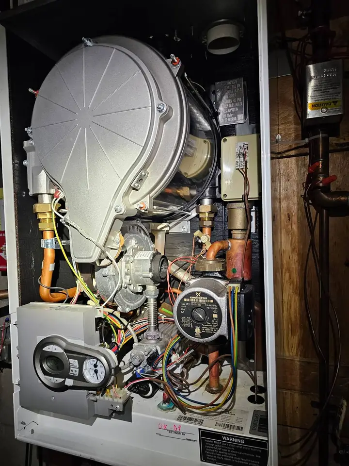 Opened gas furnace during service